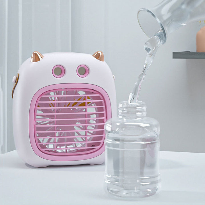 Cooling compact tabletop evaporative misting fan humidifier with refillable top-fill reservoir and adjustable airflow Bowlift