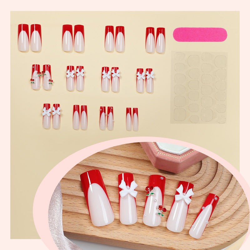 Creative nail set with festive cherry motifs Bowlift