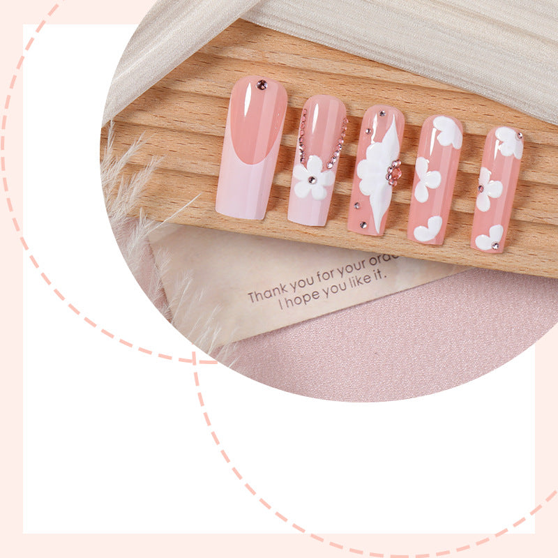 Artificial nail set with delicate flower and glitter details Bowlift