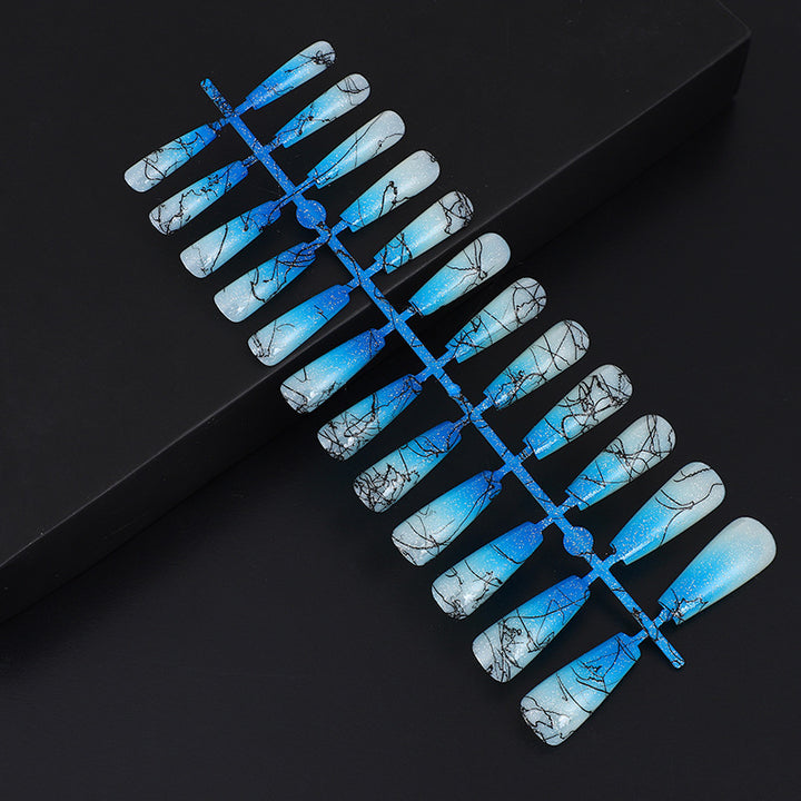 Artificial nails in modern ombre design with marbled accents Bowlift