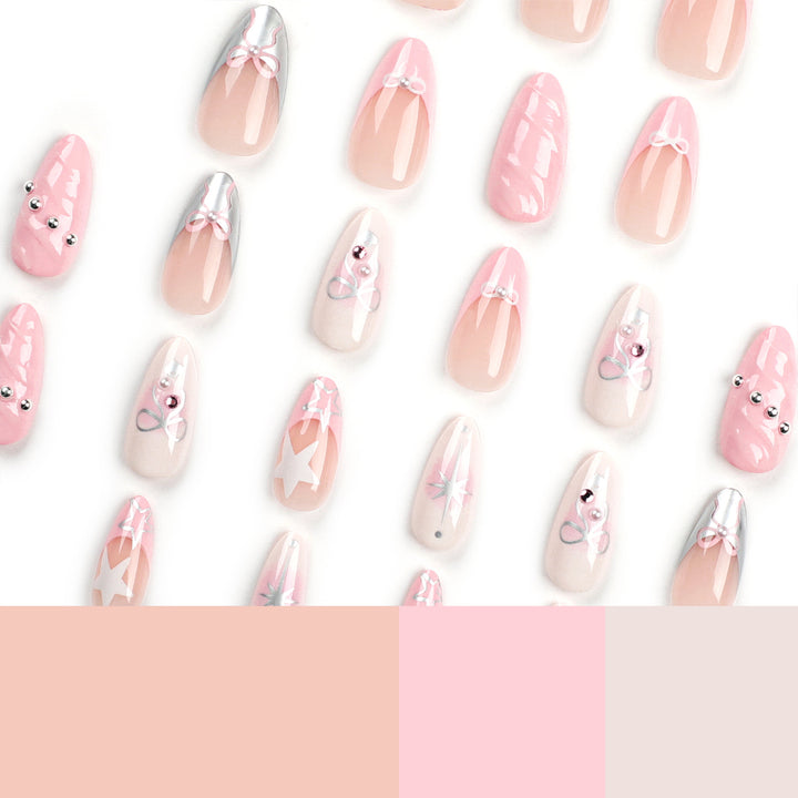 Artistic Nail Art with decorative bows and glitter accents Bowlift