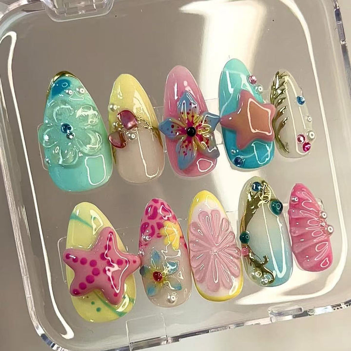 Colorful artificial nails with rhinestones Bowlift