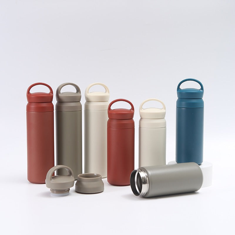 Women's premium insulated drinking bottle with ergonomic grip Bowlift