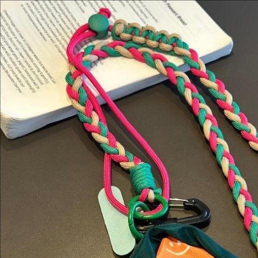Braided crossbody phone lanyard with detachable mini pouch and adjustable cord Bowlift