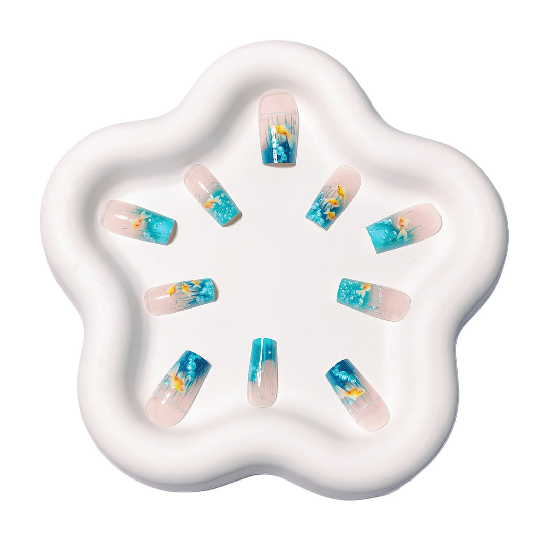 Creative art nails with maritime goldfish design Bowlift