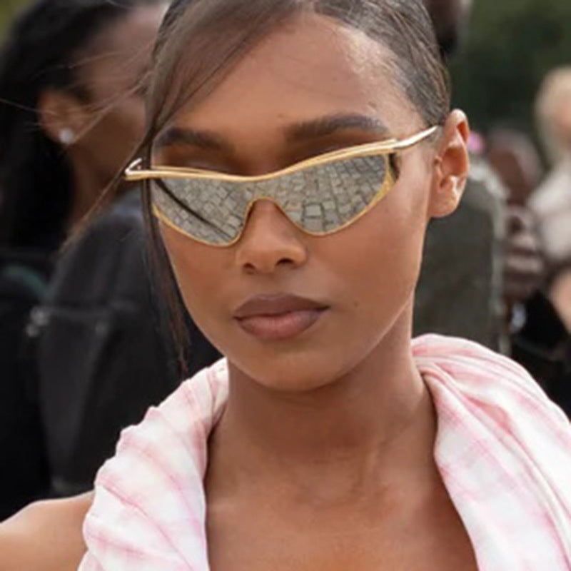Ladies extravagant shaped sunglasses with protective UV filter Bowlift