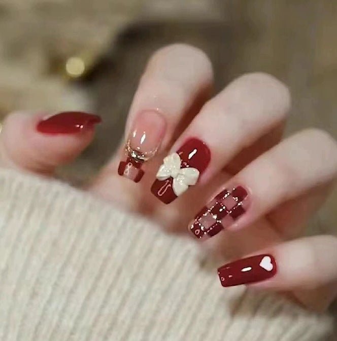 Elegant nail design with pearl embellishment Bowlift