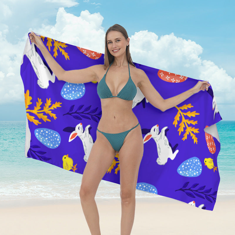 Beach towel with vibrant tropical plant motif Bowlift