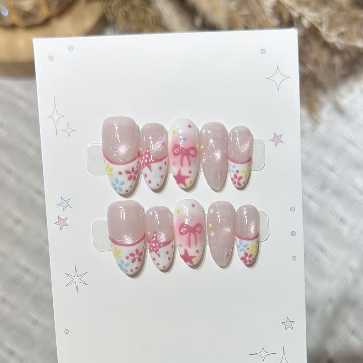 Artistic Press-On Nail Art Set with Charming Star and Bow Designs Bowlift