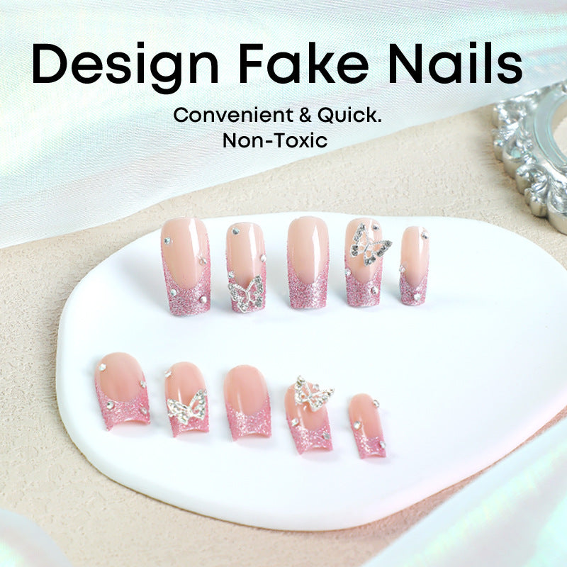 Acrylic nail set with sparkling glitter accents and elegant butterfly motifs Bowlift