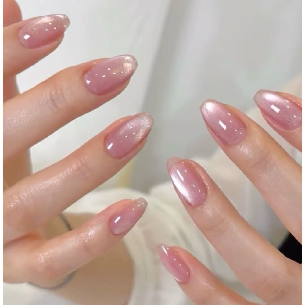 Glamorous artificial nails with shimmering effect and elegant shape Bowlift