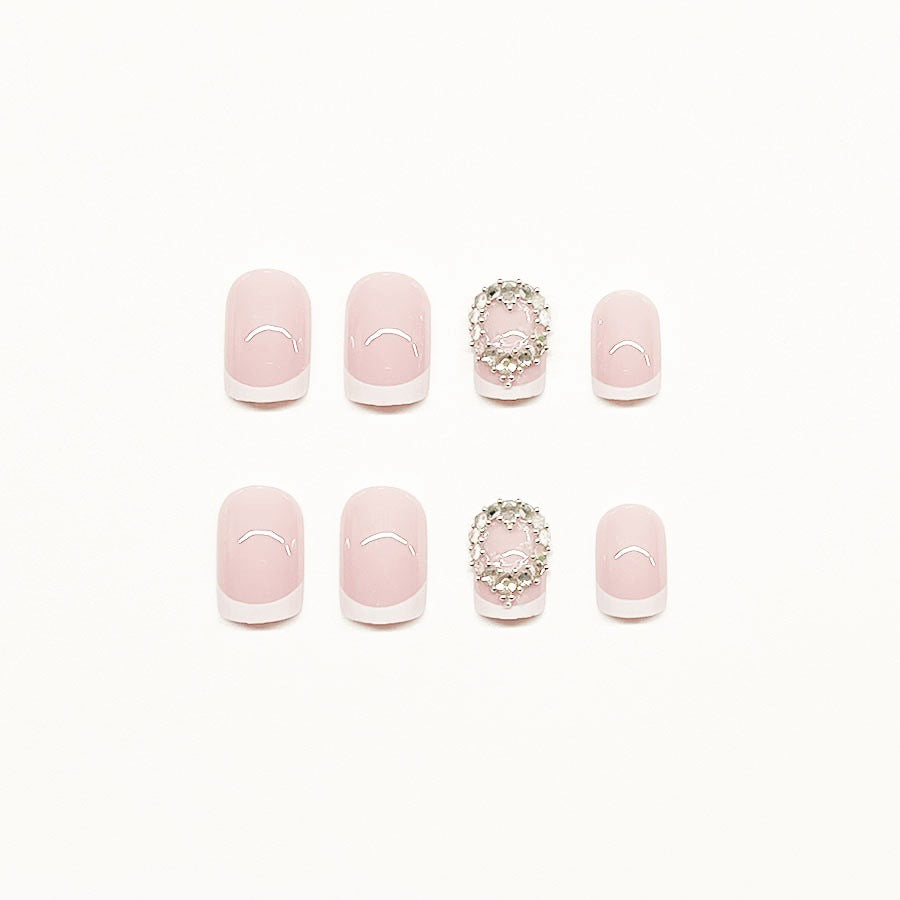 Artificial nail set with elegant French design and rhinestone embellishments Bowlift