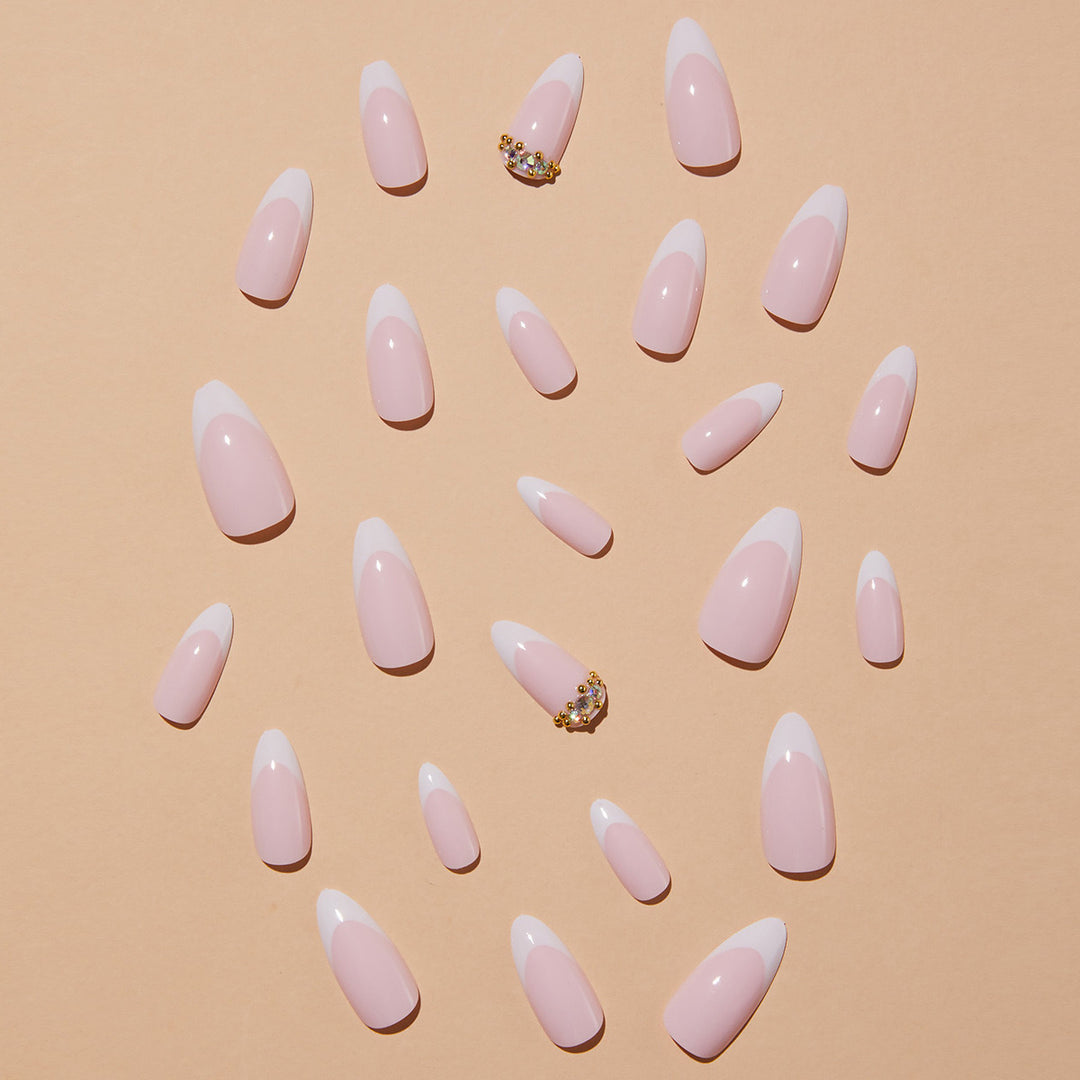 Elegant artificial nails with stylish French design and glitter accents Bowlift