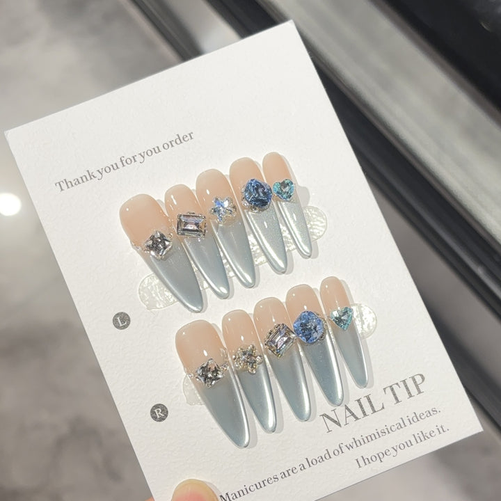 Glamorous artificial nails with sparkling stones Bowlift