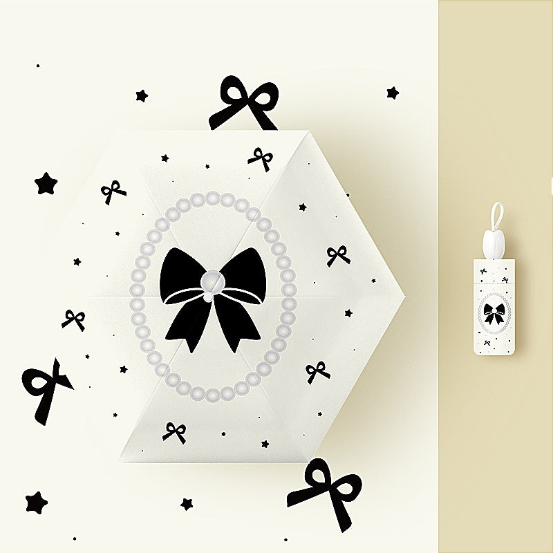 Ladies' kid-friendly folding umbrella with fun rabbit design Bowlift