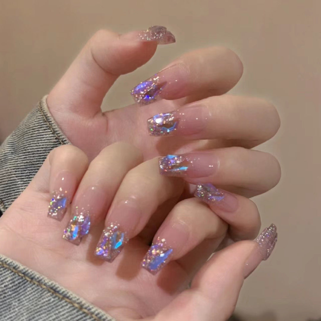 Artificial nail set with glamorous glitter accents and elegant elements Bowlift
