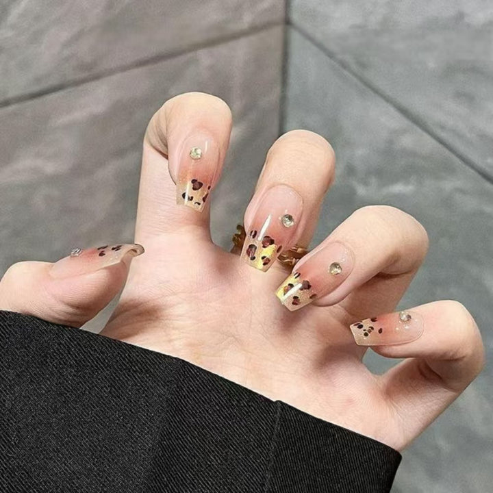 Artistic Press-On Nail Set with Floral and Heart Designs Bowlift