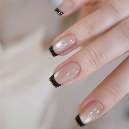 Acrylic nail set with elegant French design and glitter accents Bowlift