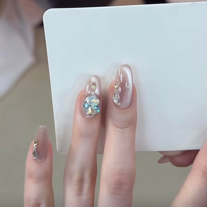Glamorous artificial nails with rhinestone embellishments Bowlift