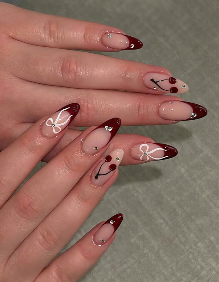 Artistic Stiletto Press-On Nail Set with Cherry and Bow Designs Bowlift