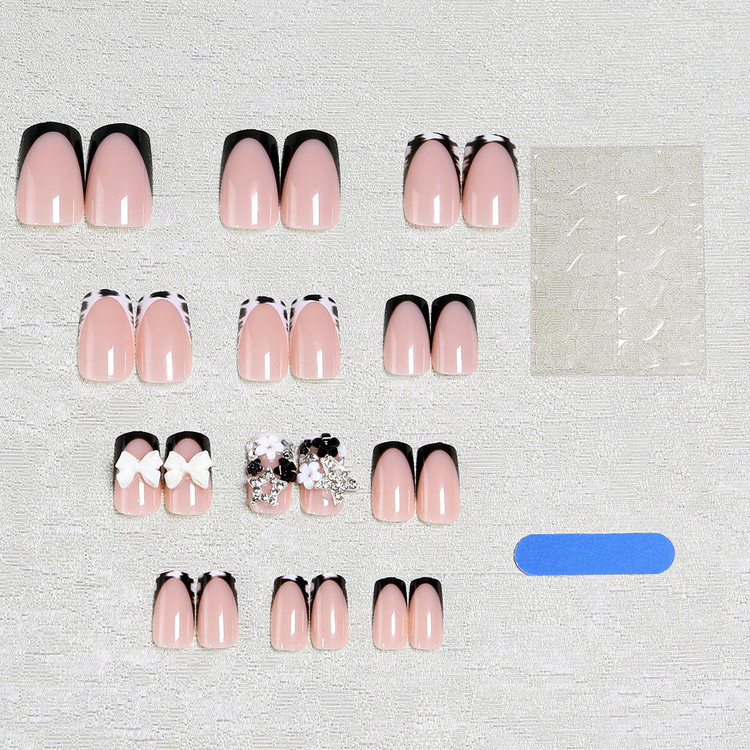 Artificial nail design with elaborate 3D decorations Bowlift