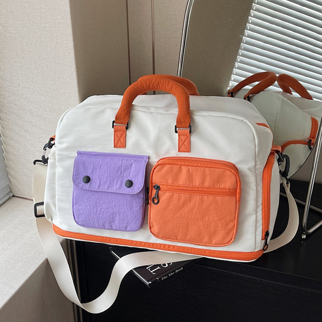 Sporty travel bag with multifunctional outer pockets Bowlift