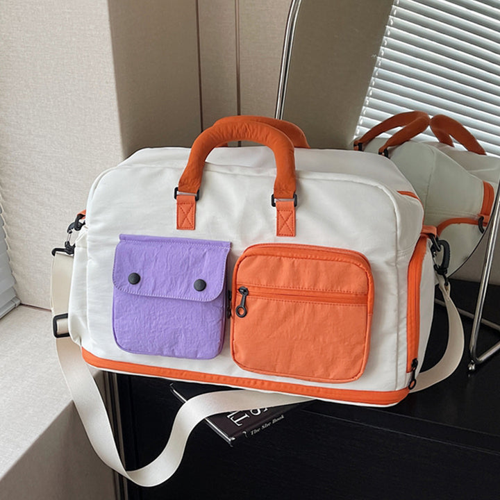 Sporty travel bag with multifunctional outer pockets Bowlift