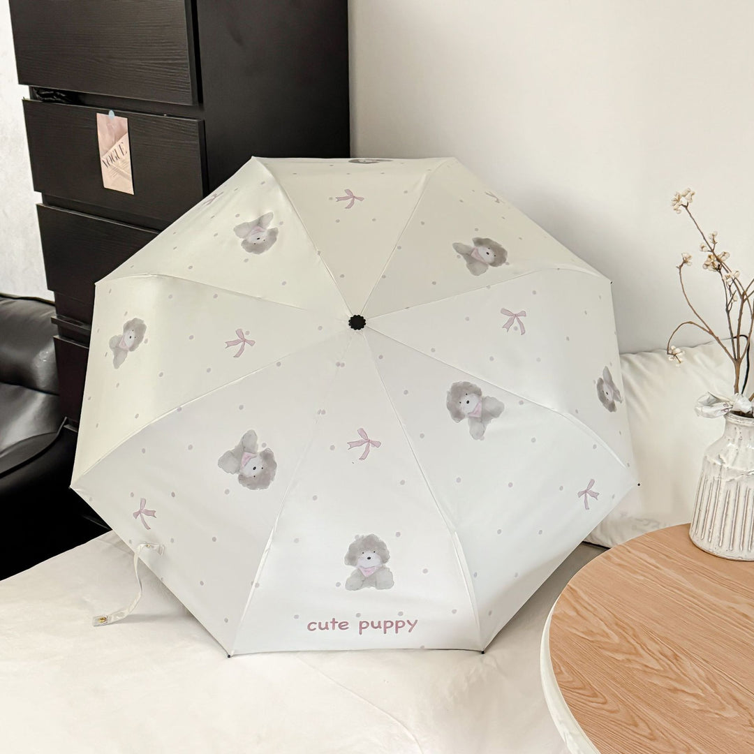 Ladies folding umbrella with playful animal design Bowlift