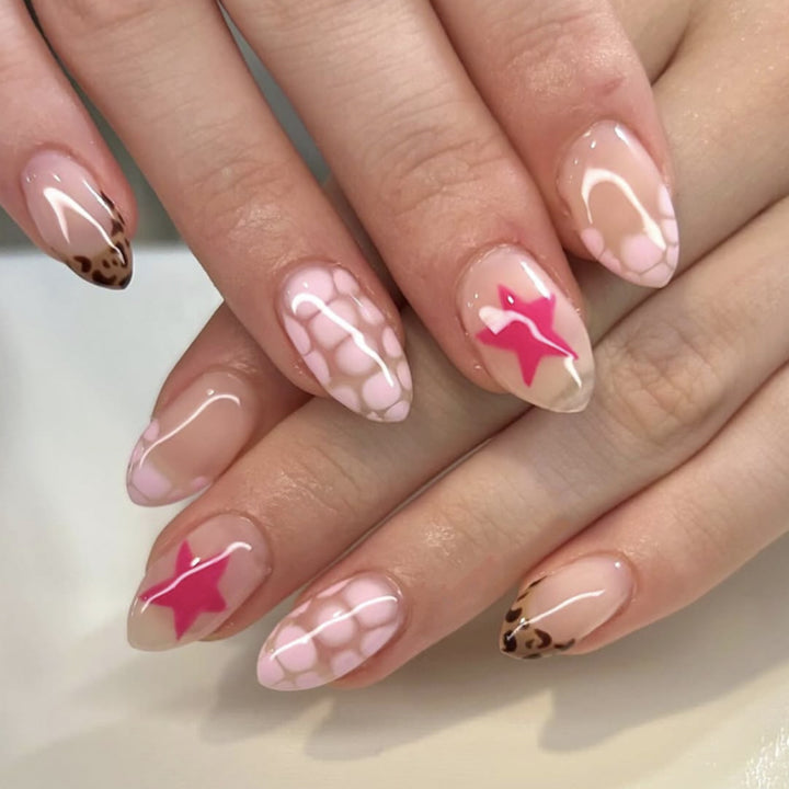 Artificial nail art with playful dots and bows Bowlift