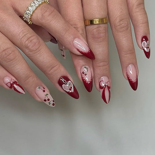 Creative nail set with romantic heart and bow accents Bowlift