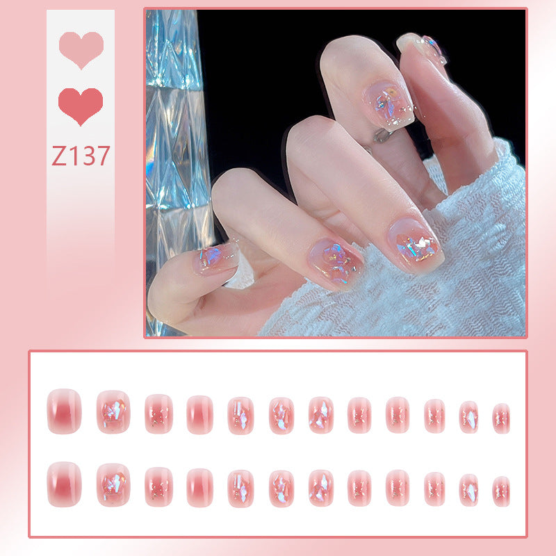 Nail set with sparkling 3D applications and romantic elements Bowlift