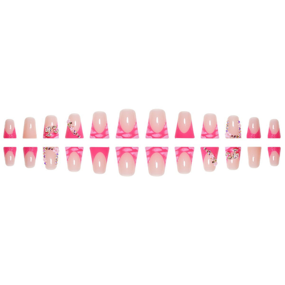 Artistic Press-On Nail Extensions with Rhinestone Accents Bowlift