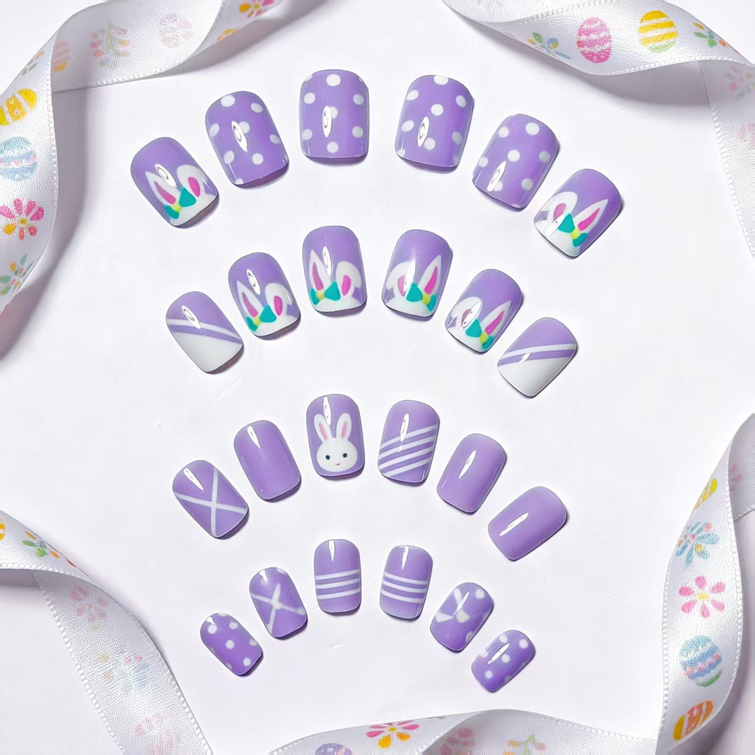 Artificial nails in creative Easter design Bowlift
