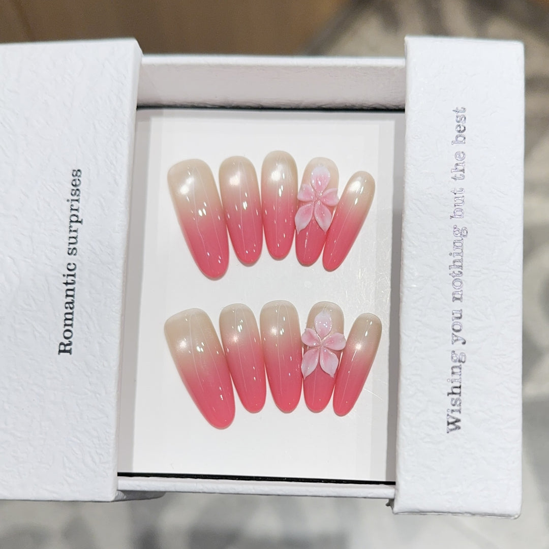Artificial nails with romantic ombre design and floral accents Bowlift