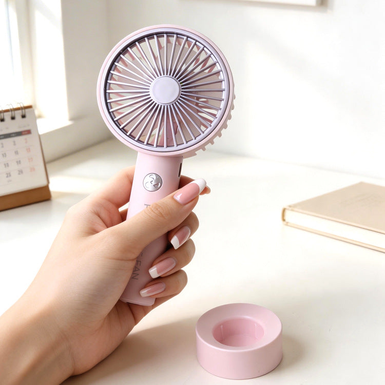 Women's portable mini hand fan with USB charging function and ergonomic handle Bowlift