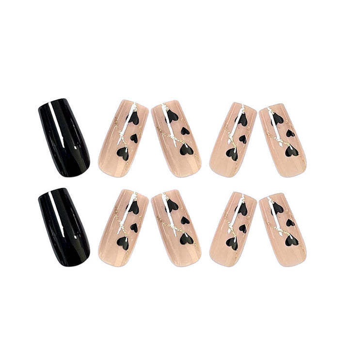 Artistic acrylic nails with heart design and glitter accents Bowlift
