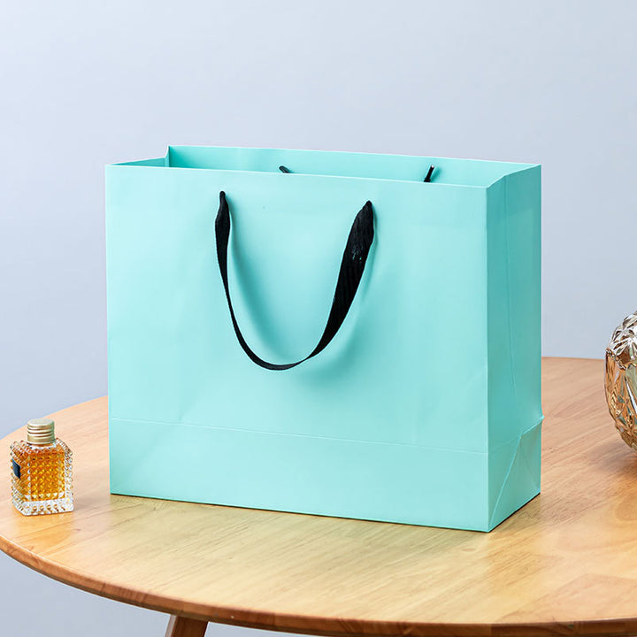Premium Reusable Paper Gift Bag with Ribbon Handles and Reinforced Base Bowlift