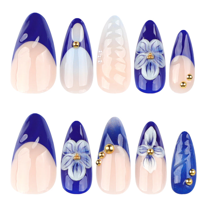 Artistic nail art with floral accents and glitter embellishments Bowlift