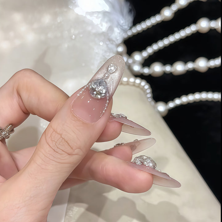Glamorous artificial nail tips with rhinestone accents Bowlift