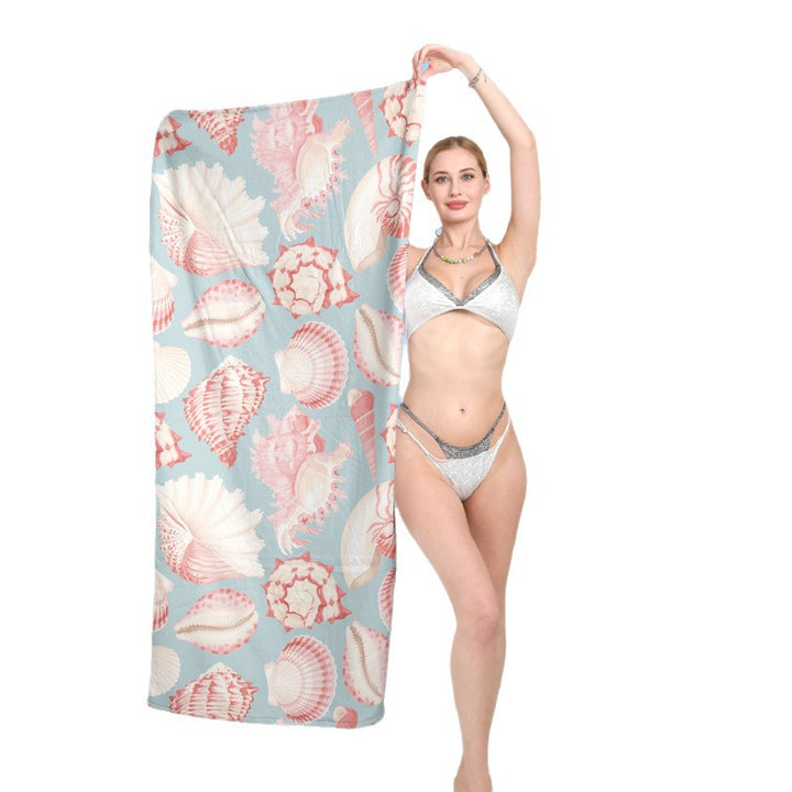 Beach towel with exotic shell motif Bowlift