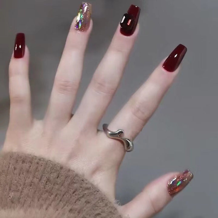 Glamorous artificial nails with crystal elements Bowlift
