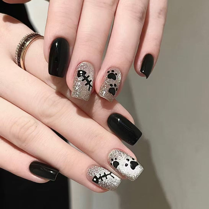 Artistic Press-On Nail Set with Floral and Glossy Accents Bowlift
