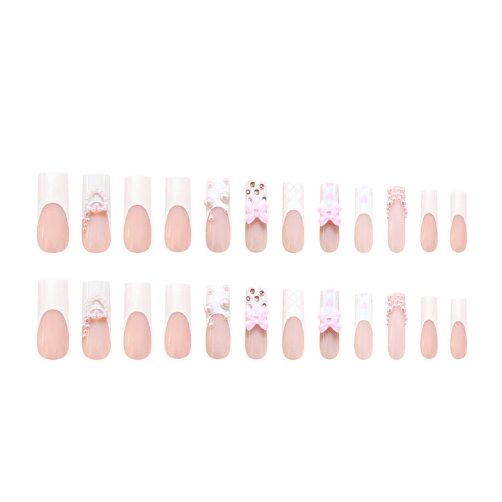 Artistic acrylic nails with bow and pearl decorations Bowlift