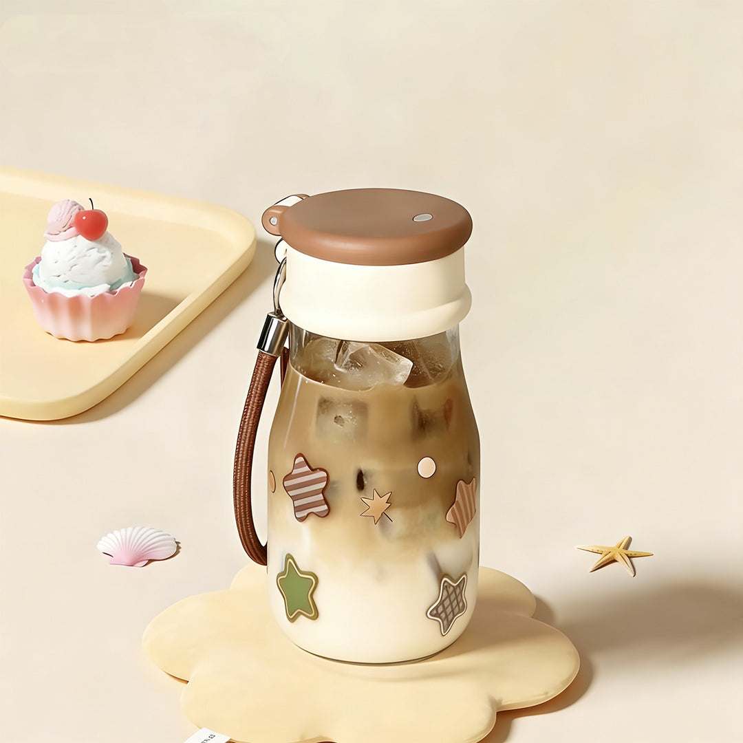 Ladies drinking bottle with playful print and practical carrying handle Bowlift