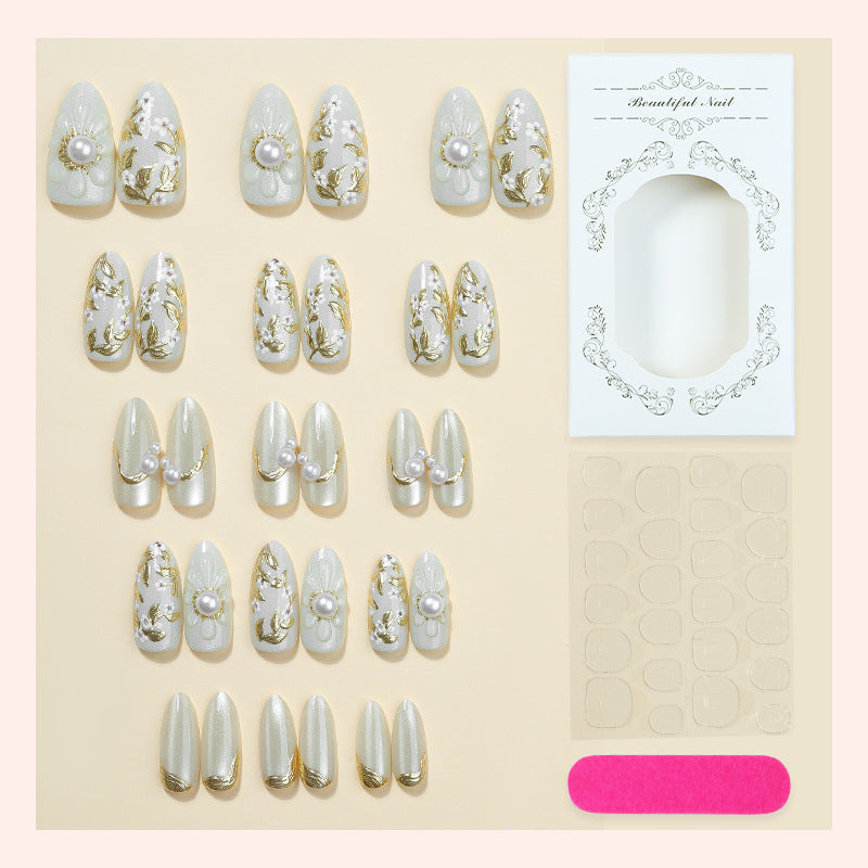Artificial nail set with elegant flower and pearl decorations Bowlift