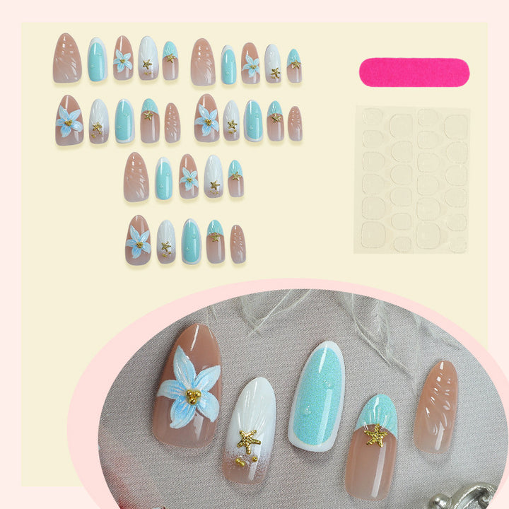 Artificial nail set with floral design and artistic embellishments Bowlift