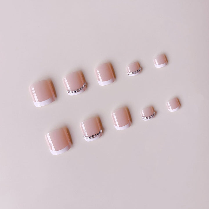 Nail art set with elegant French design and sparkling accents Bowlift