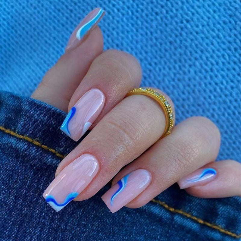 Artful nail extensions with maritime wave pattern Bowlift