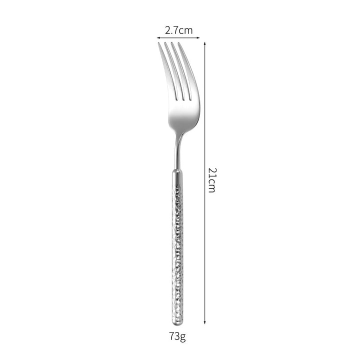 Elegant dessert spoon with elaborate handle design Bowlift