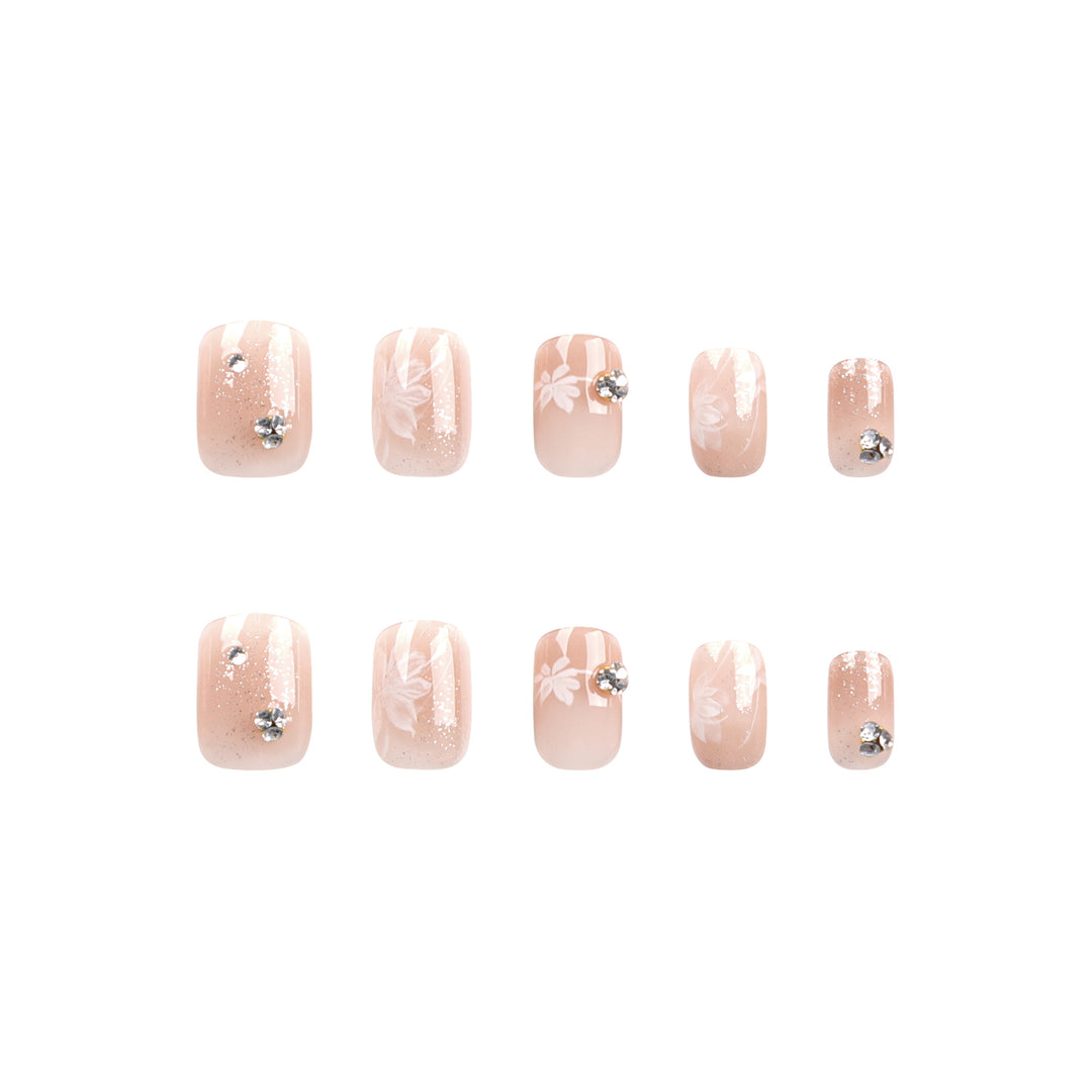 Elegant Nail Art with Holographic Accents and Floral Embellishments Bowlift